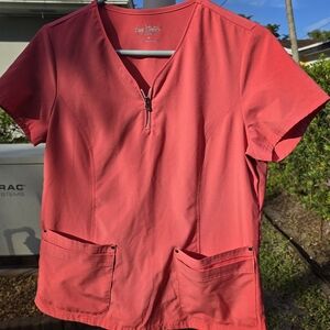 Womans peach scrub top